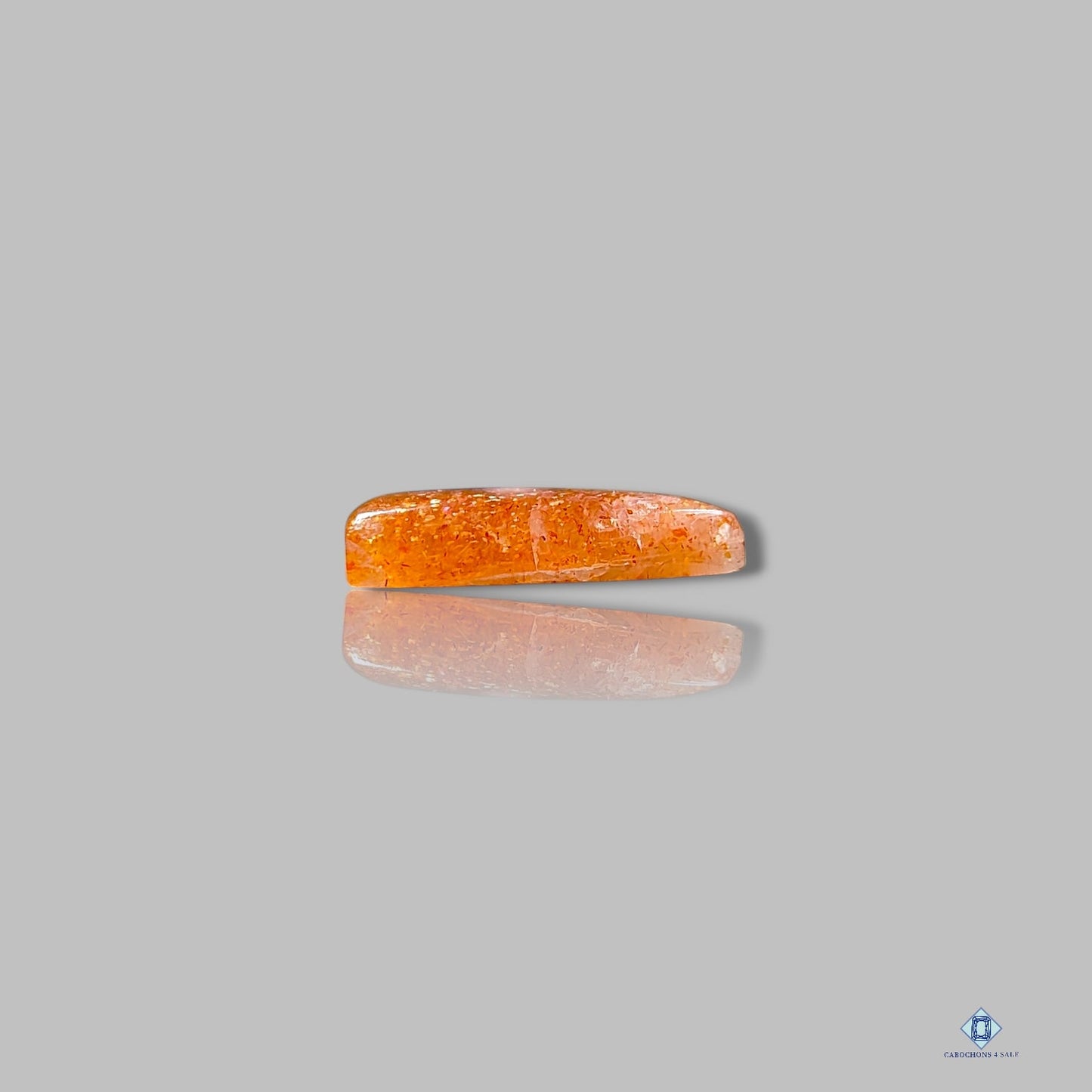 Cabujones triangulares de piedra solar africana