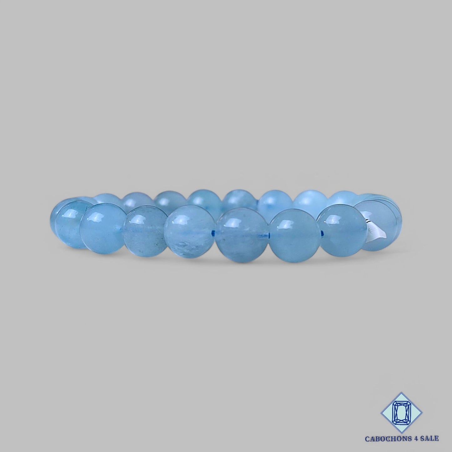 Cuentas redondas de aguamarina natural de 7 pulgadas x 9 mm procedentes de Brasil, disponibles para la venta.
