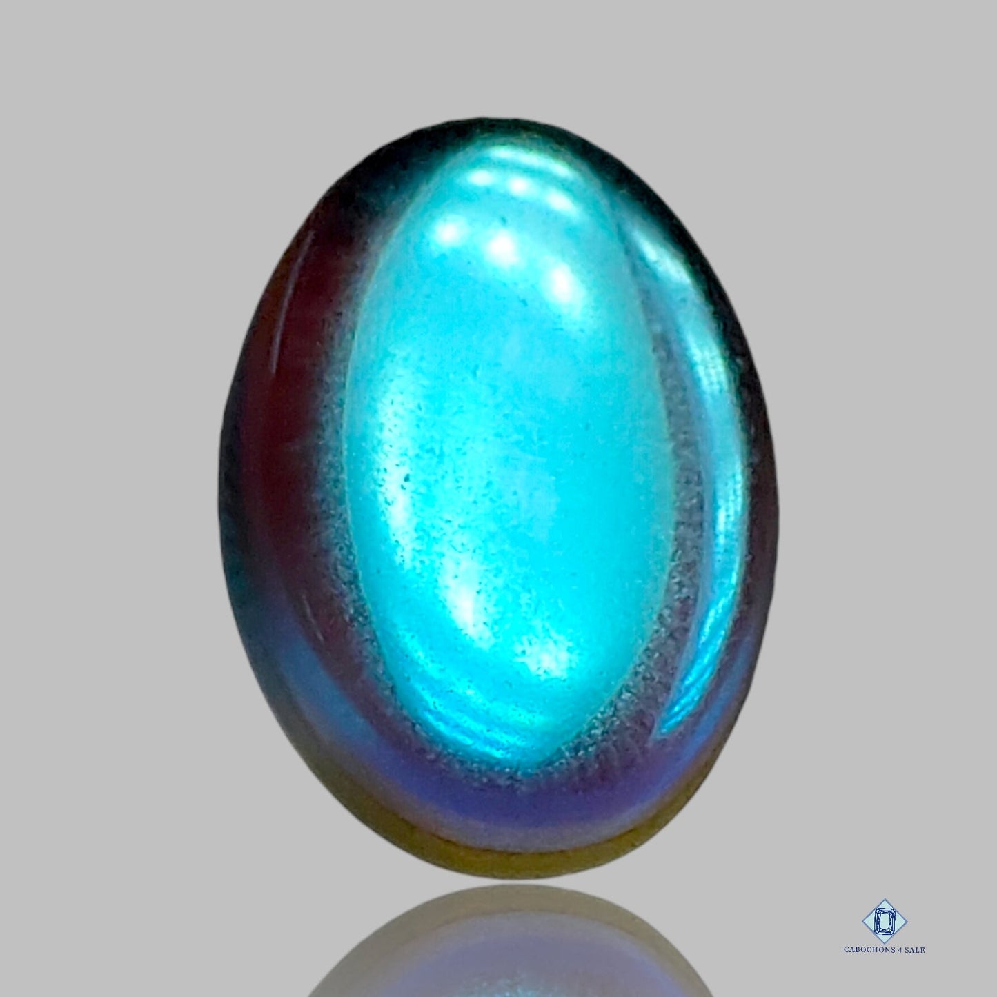 Cabujones ovalados de vidrio Aura