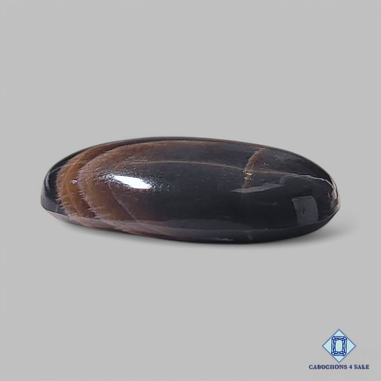 Natural Black Tanzanian Gemstone Oval Cabochons 24*20*7mm from Tanzania available for sale