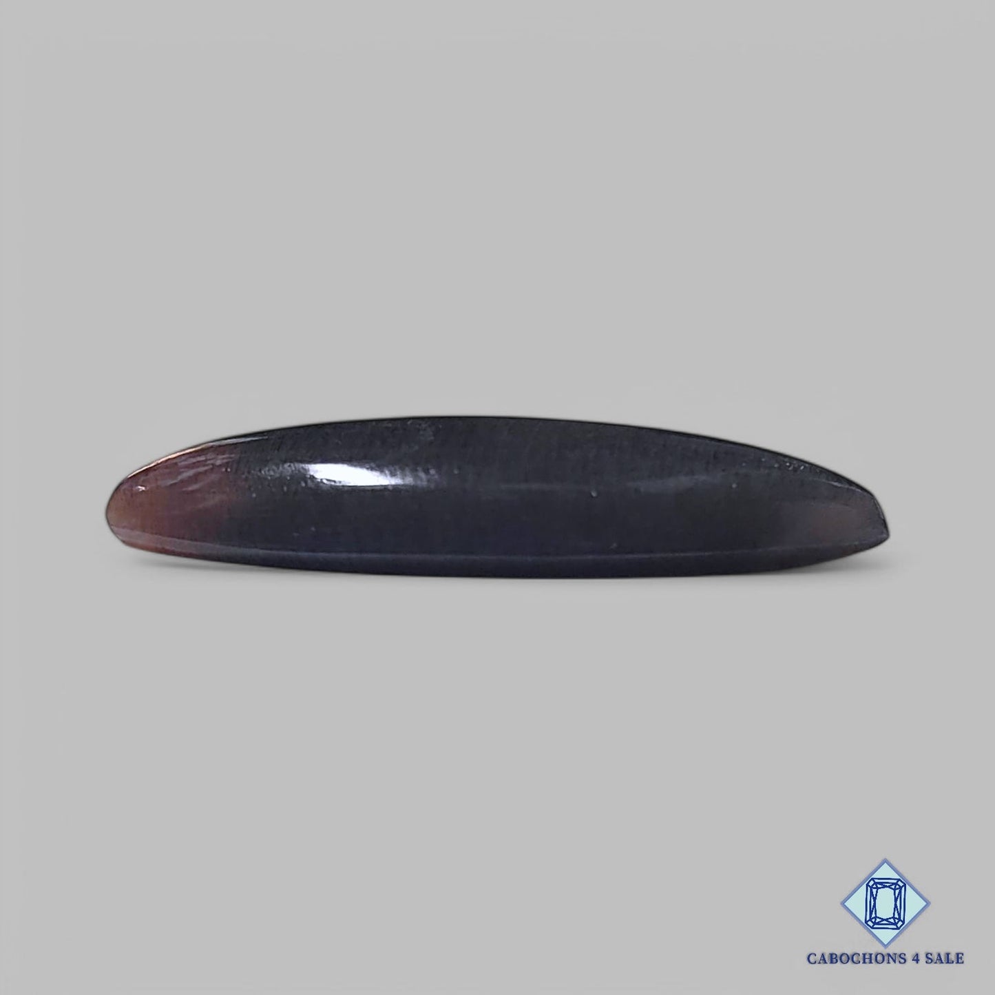 Cabujones marquesa de piedra solar negra natural de Tanzania, 32 x 14 x 5 mm, disponibles para la venta.