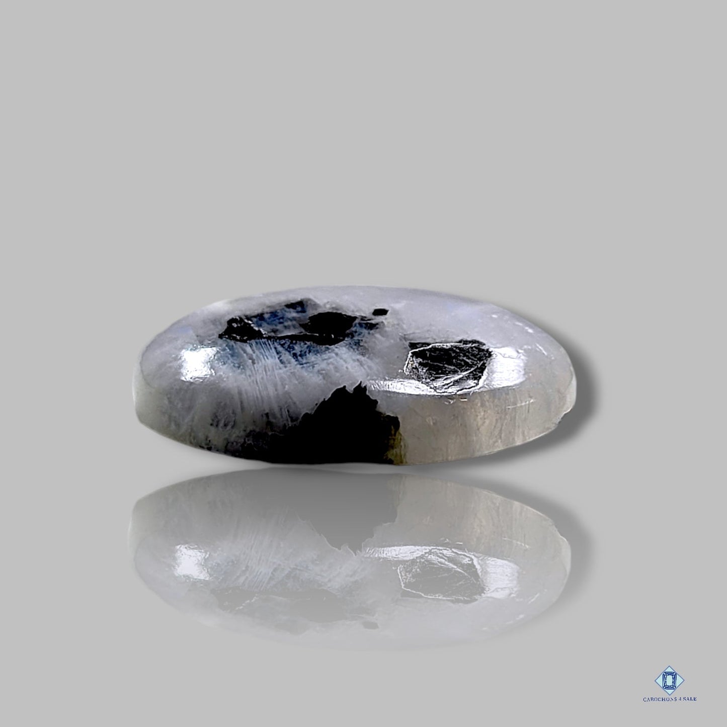 Cabujones ovalados de piedra lunar turmalada negra