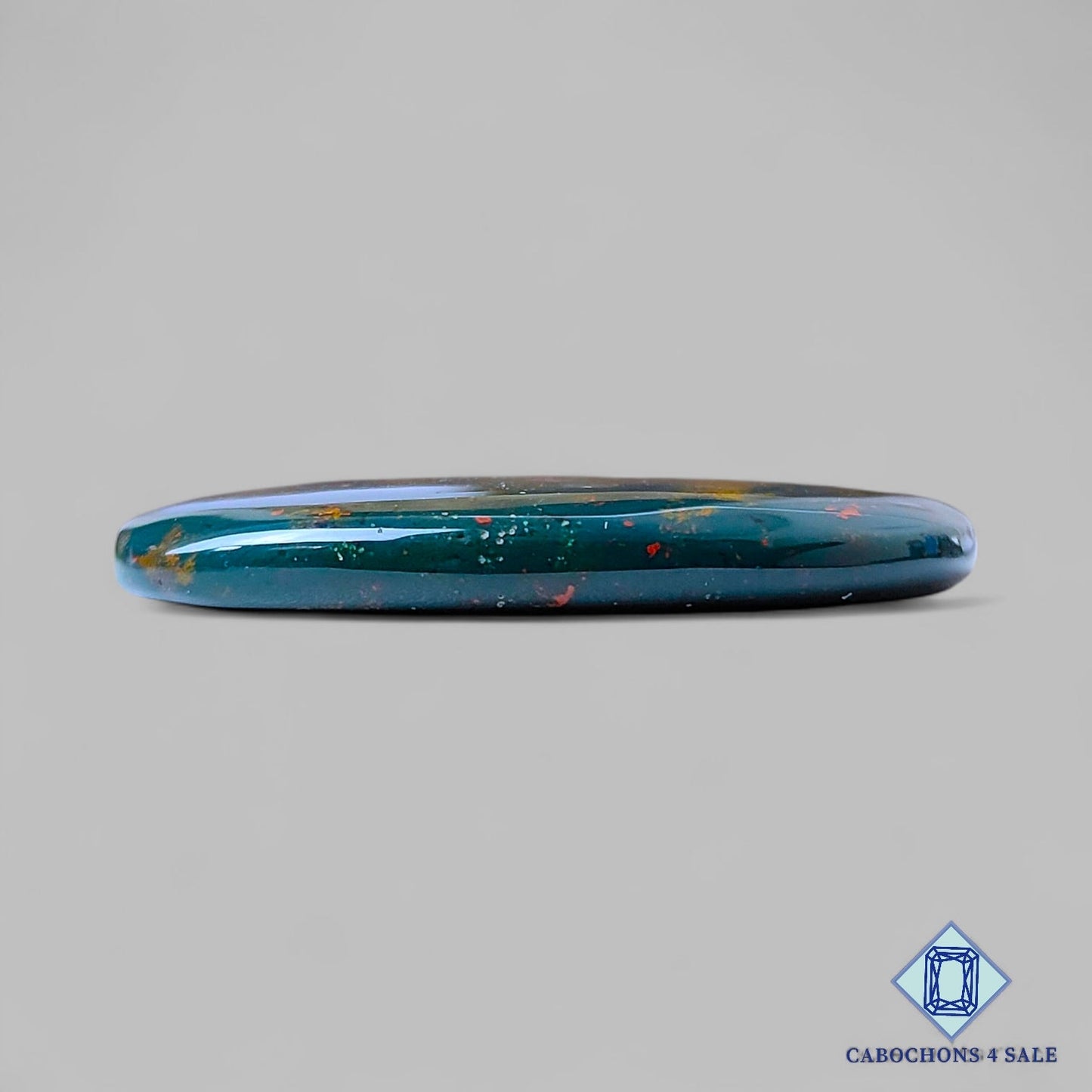 Cabujones ovalados de piedra de sangre natural de 38 x 26 x 5 mm, de Brasil, disponibles para la venta.