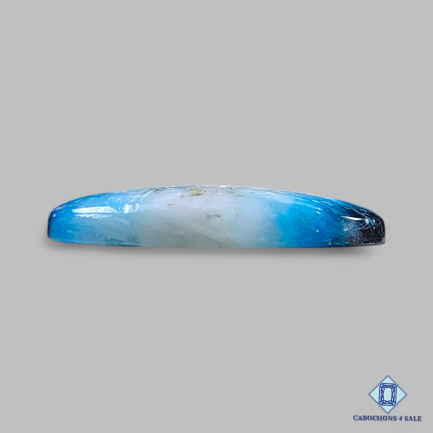 Cabujones ovalados de piedra preciosa de glacierita azul hielo natural de 32 x 17 x 5 mm de Indonesia, disponibles para la venta.