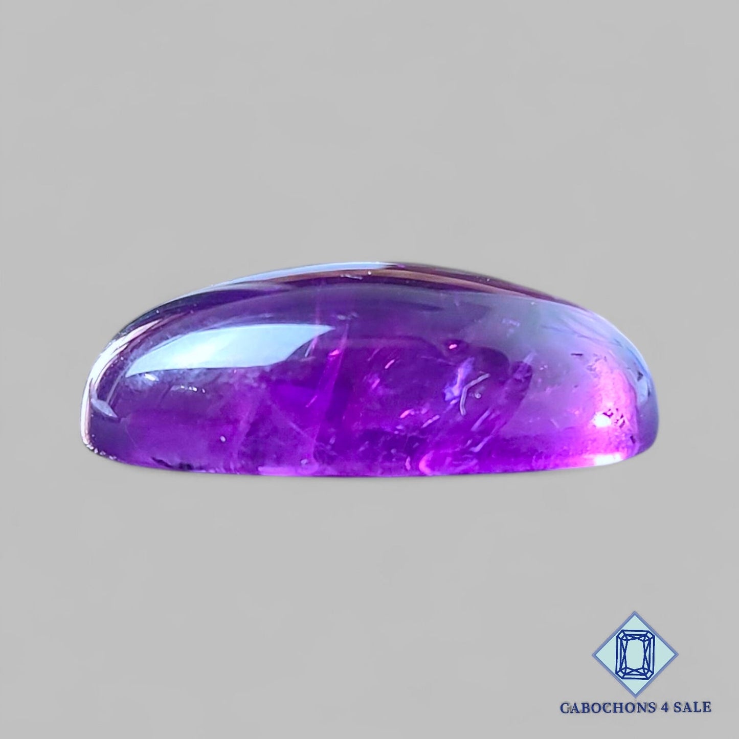Cabujones ovalados de amatista brasileña natural de 24 x 15 x 8 mm, disponibles para la venta.