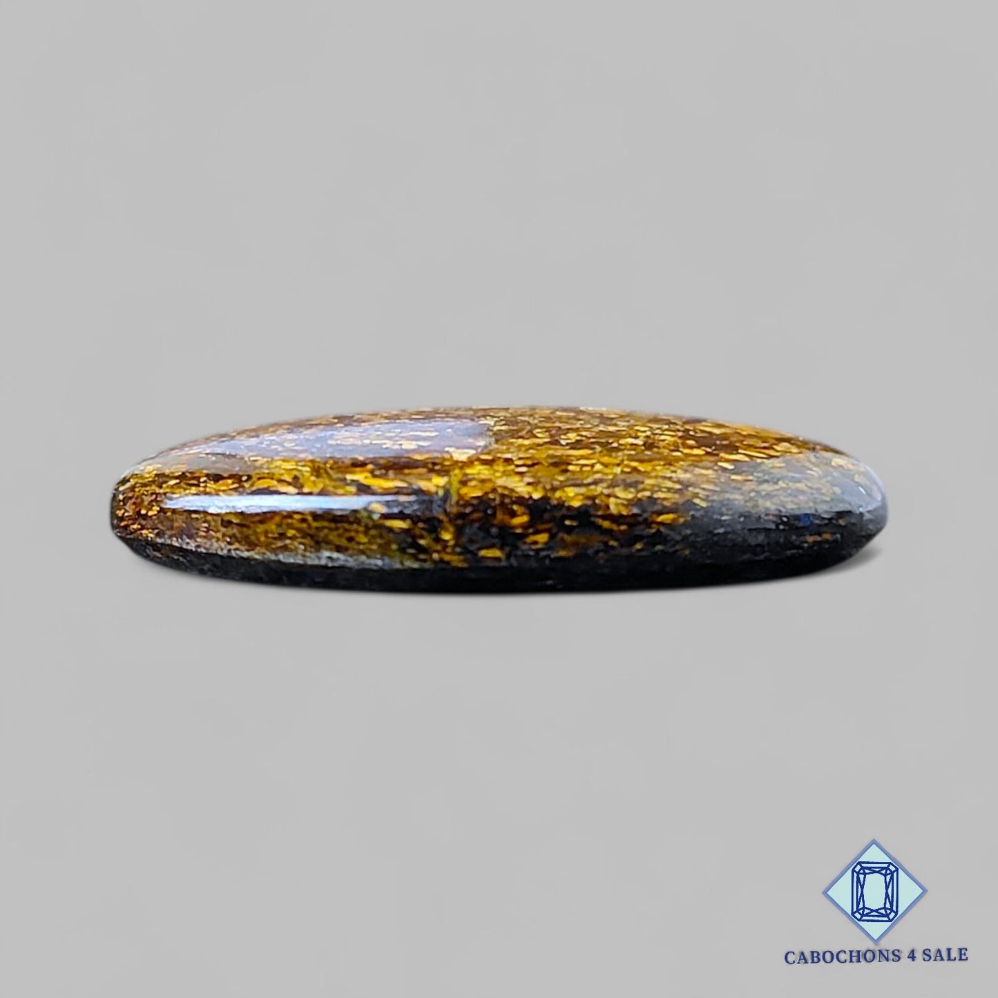 Cabujones ovalados de piedra preciosa de broncita natural de 28 x 20 x 5 mm, procedentes de Brasil, disponibles para la venta.