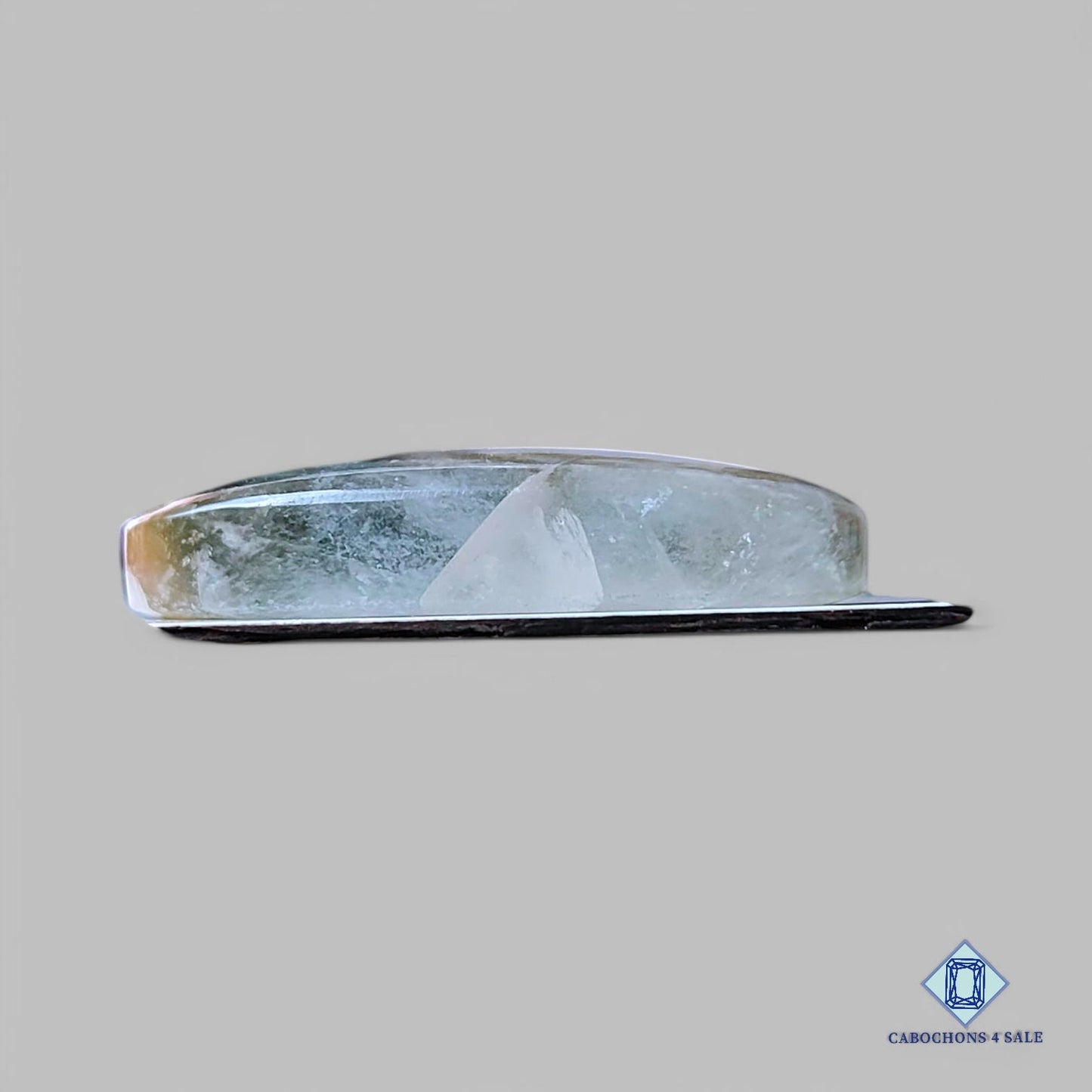 Cabujones ovalados de cuarzo rutilado cacoxenita natural de 29 x 18 x 6 mm, de Brasil, disponibles para la venta.