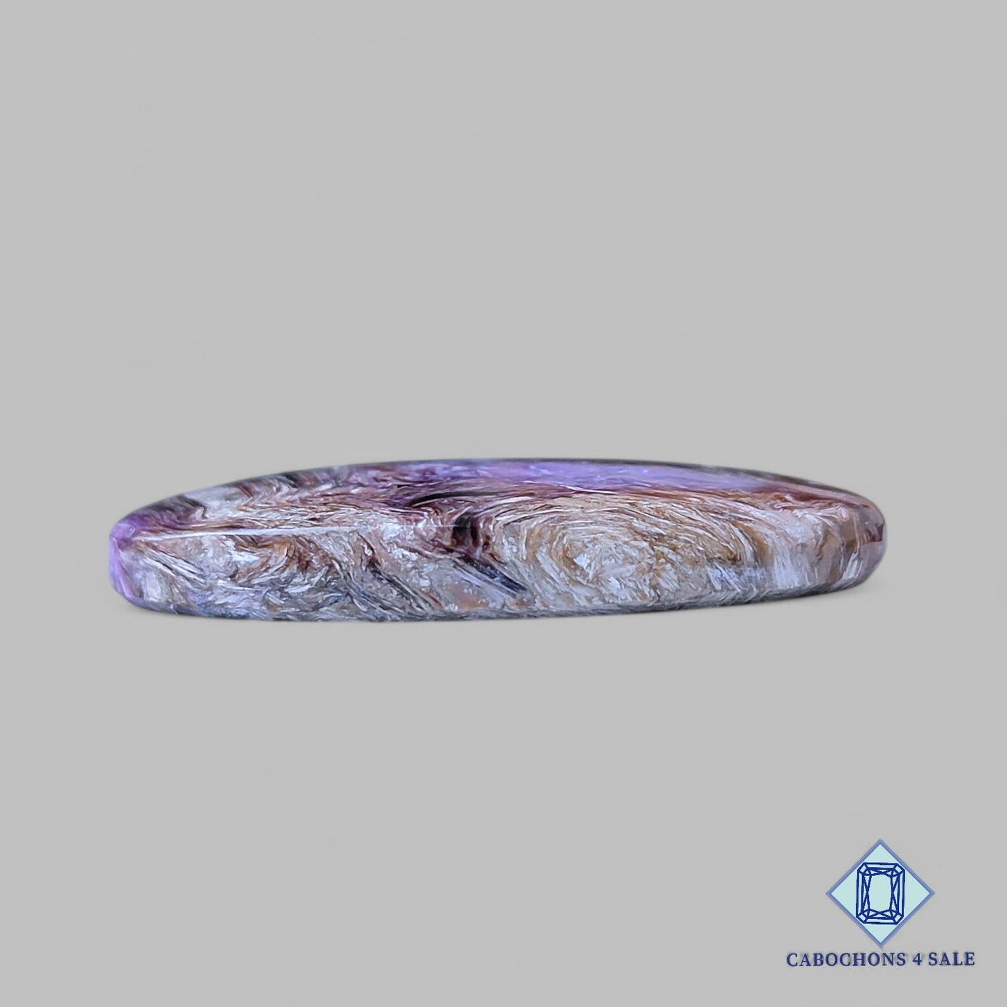 Cabujones ovalados de piedra preciosa de charoita natural de 42 x 22 x 6 mm, procedentes de Rusia, disponibles para la venta.