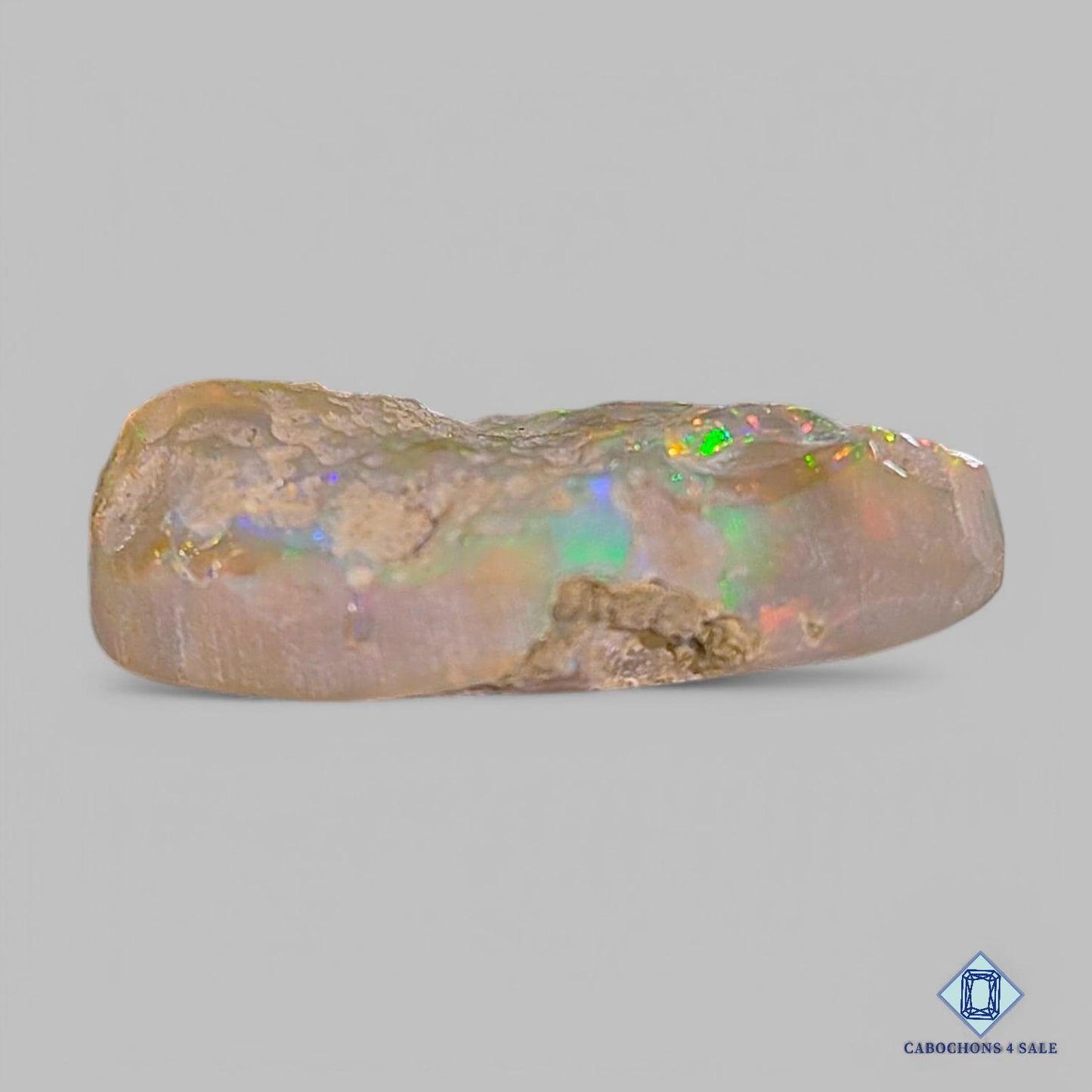 Piedra preciosa de ópalo etíope natural ovalada drusa de 25 x 14 x 7 mm, procedente de Etiopía, disponible para la venta.