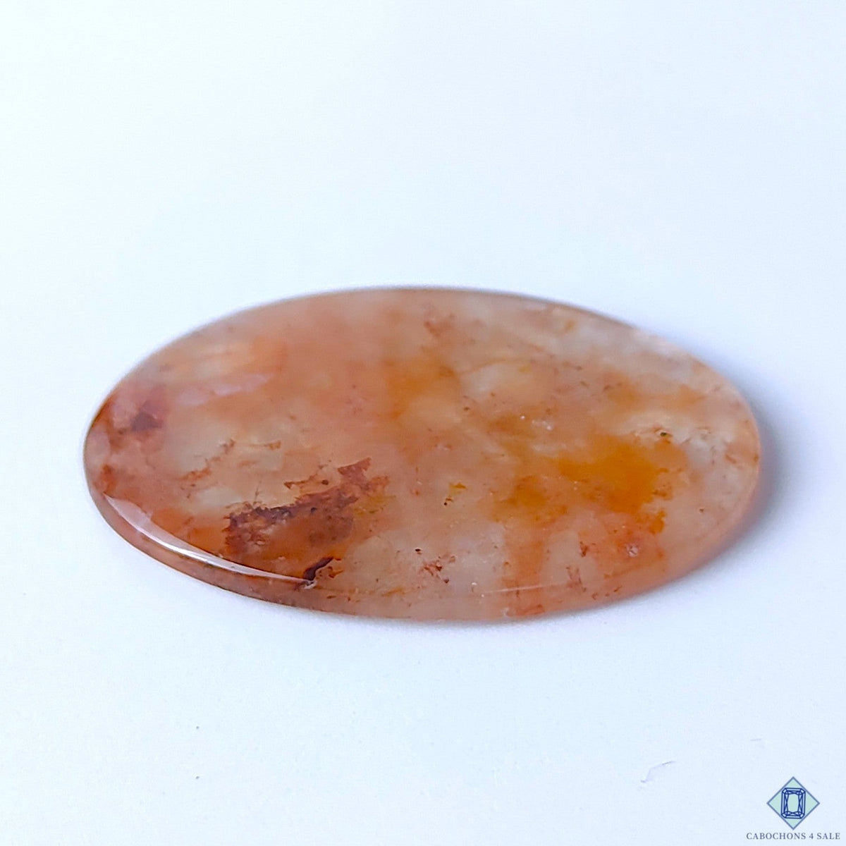 Cabochons4sale oval fire quartz cabochon with translucent red and orange inclusions, 42x31x4mm gemstone