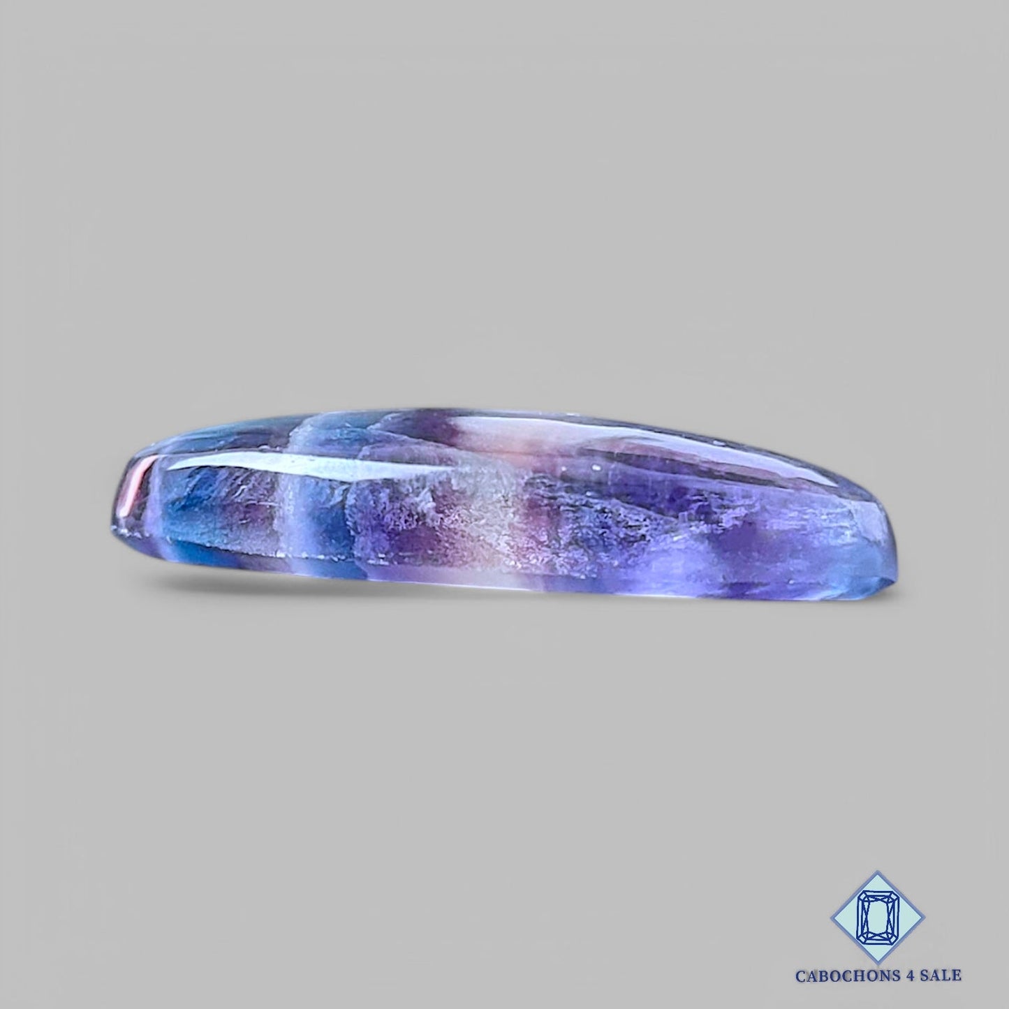 Cabujones ovalados de fluorita natural de 27 x 19 x 5 mm, procedentes de la India, disponibles para la venta.