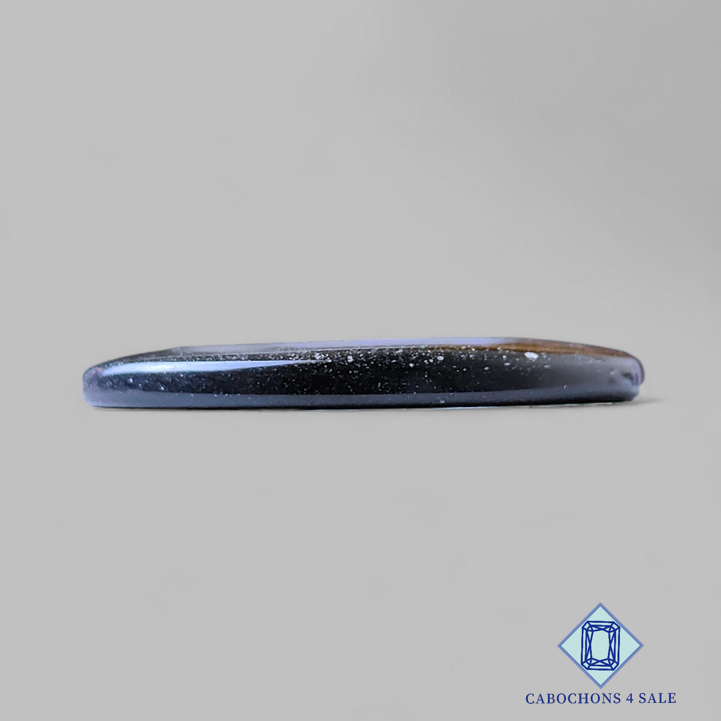 Cabujones ovalados de obsidiana dorada