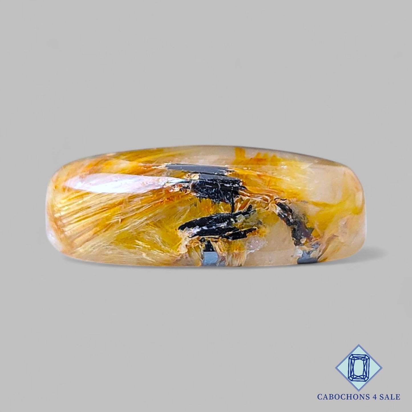 Cabujones ovalados de cuarzo rutilado dorado natural de 25 x 14 x 8 mm, de Brasil, disponibles para la venta.