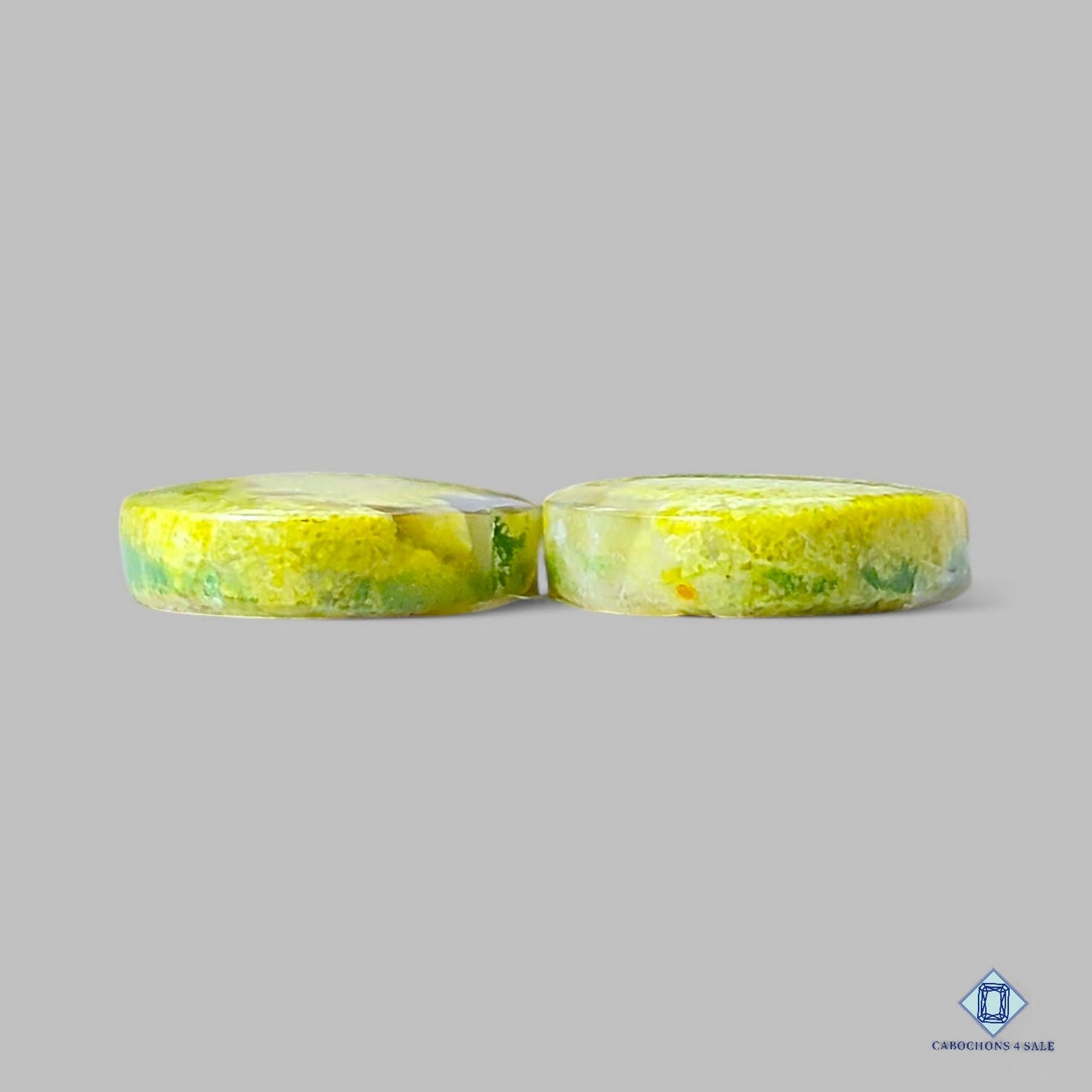 Pares de piedras preciosas ovaladas de ópalo verde natural de 27 x 14 x 4 mm de la India, disponibles para la venta.