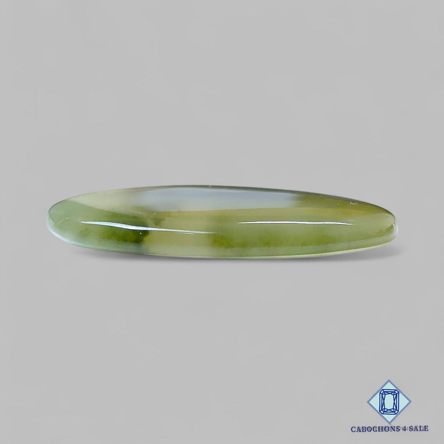 Cabujones ovalados de piedra preciosa de rutilo verde natural de 35 x 24 x 4 mm, procedentes de Brasil, disponibles para la venta.