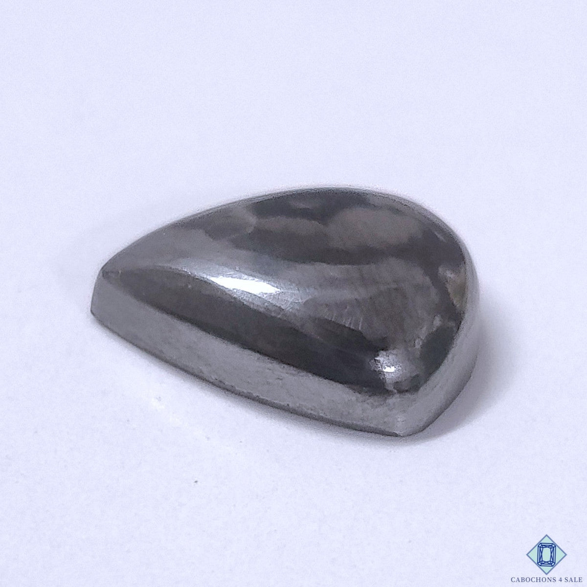 Cabochons4sale grey gun metal pear cabochon gemstone measuring 13x10x4mm with an opaque finish