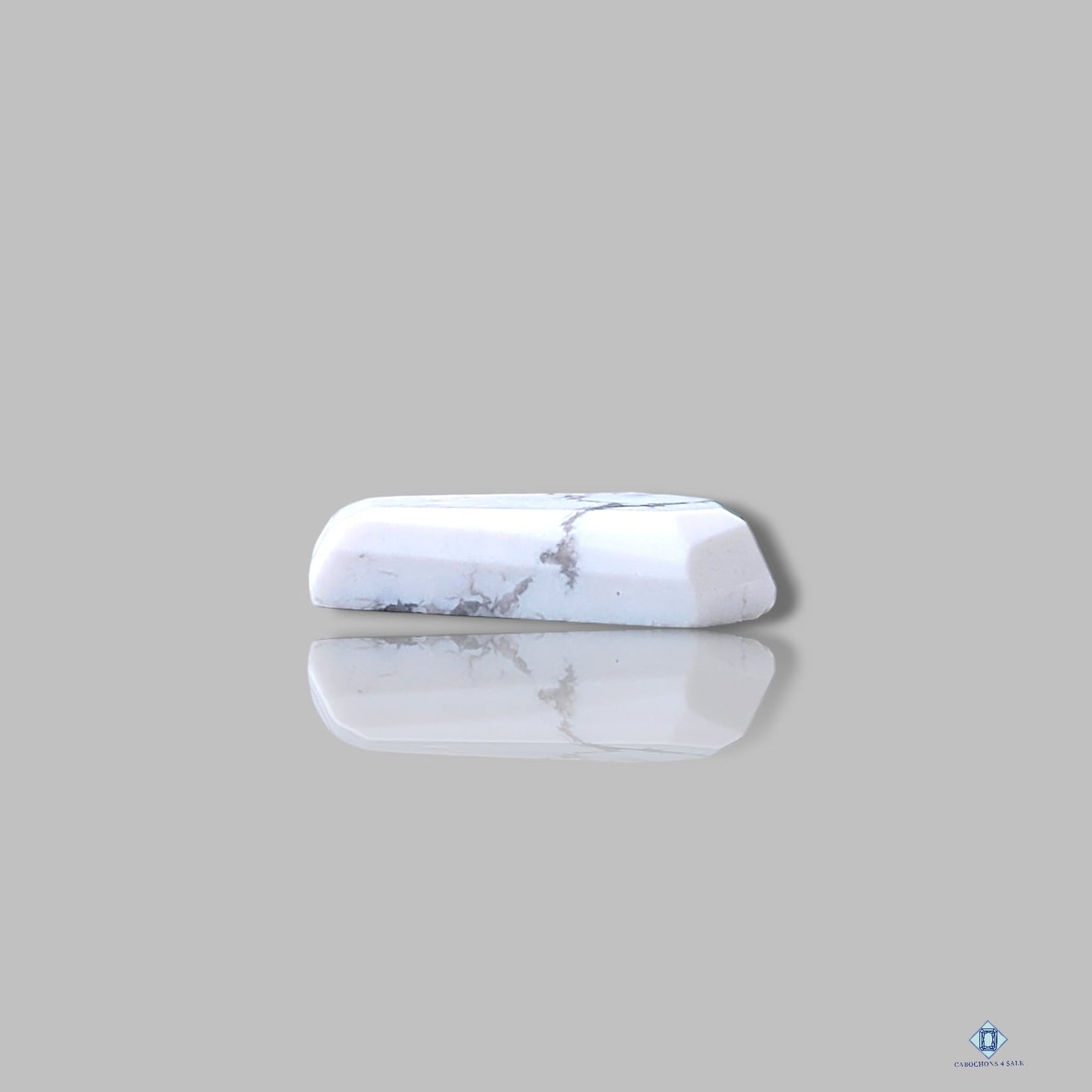 Corte escalonado de ataúd de howlita