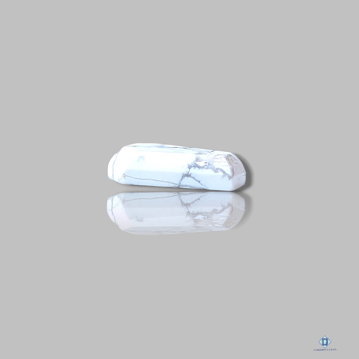 Corte escalonado de ataúd de howlita