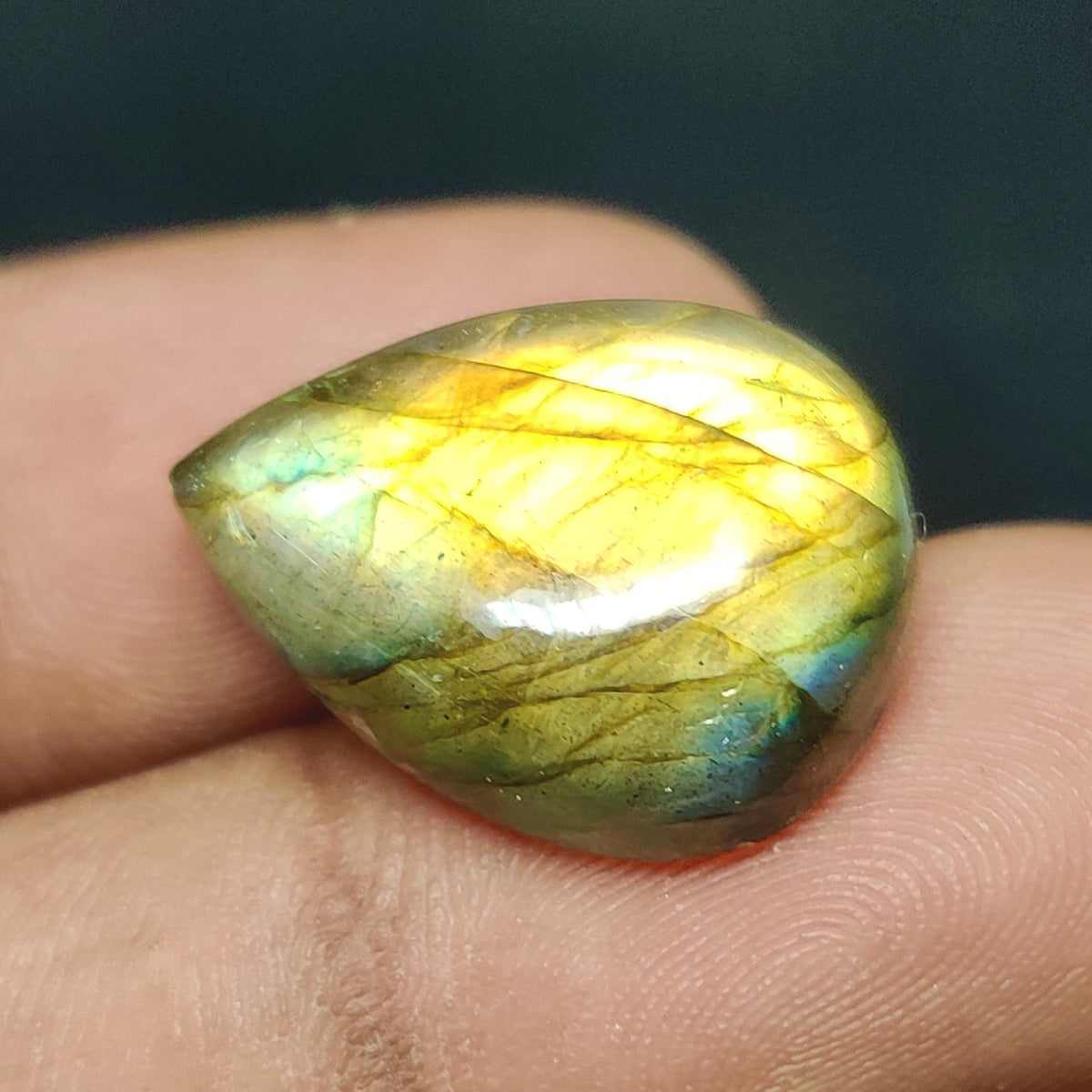 Cabochons4sale pear-shaped translucent labradorite gemstone with yellow and green iridescent flashes