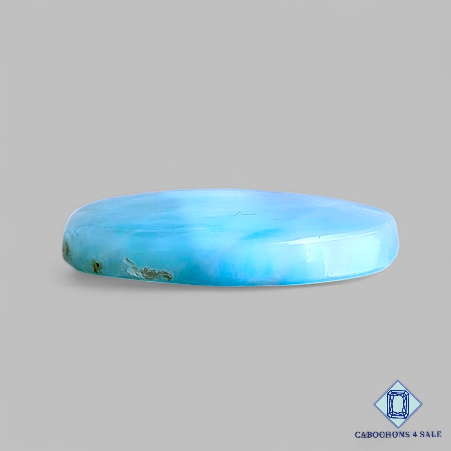 Cabujones ovalados de piedra preciosa larimar natural de 24 x 18 x 4 mm de República Dominicana disponibles para la venta.