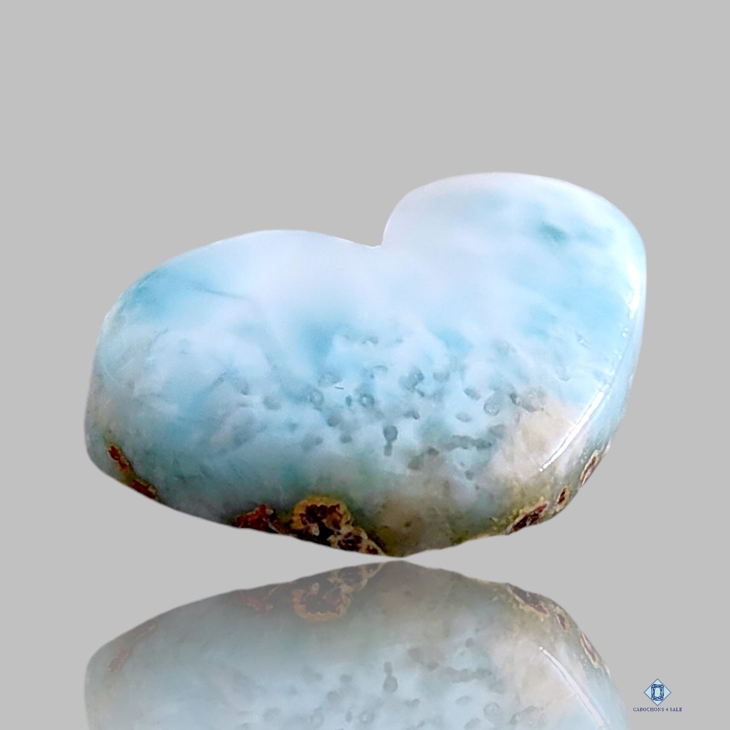 Tallas de corazón de larimar