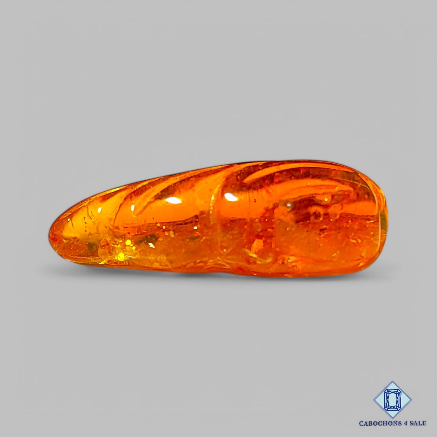 Man Made Amber Gemstone Fancy Carvings 25*13*7mm available for sale