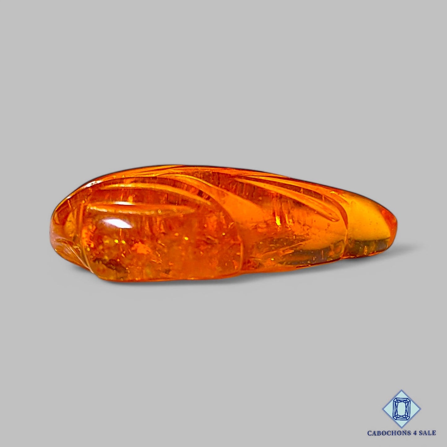 Man Made Amber Gemstone Fancy Carvings 25*14*6mm available for sale