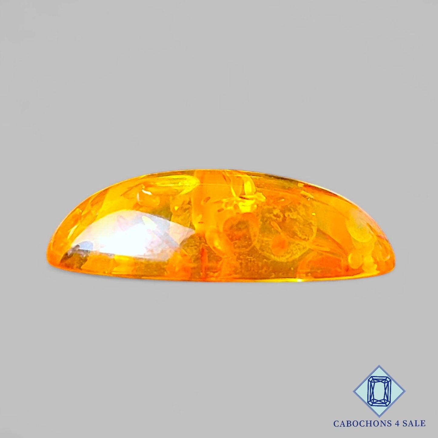 Manmade Amber Gemstone Oval Cabochons 23*16*6mm available for sale