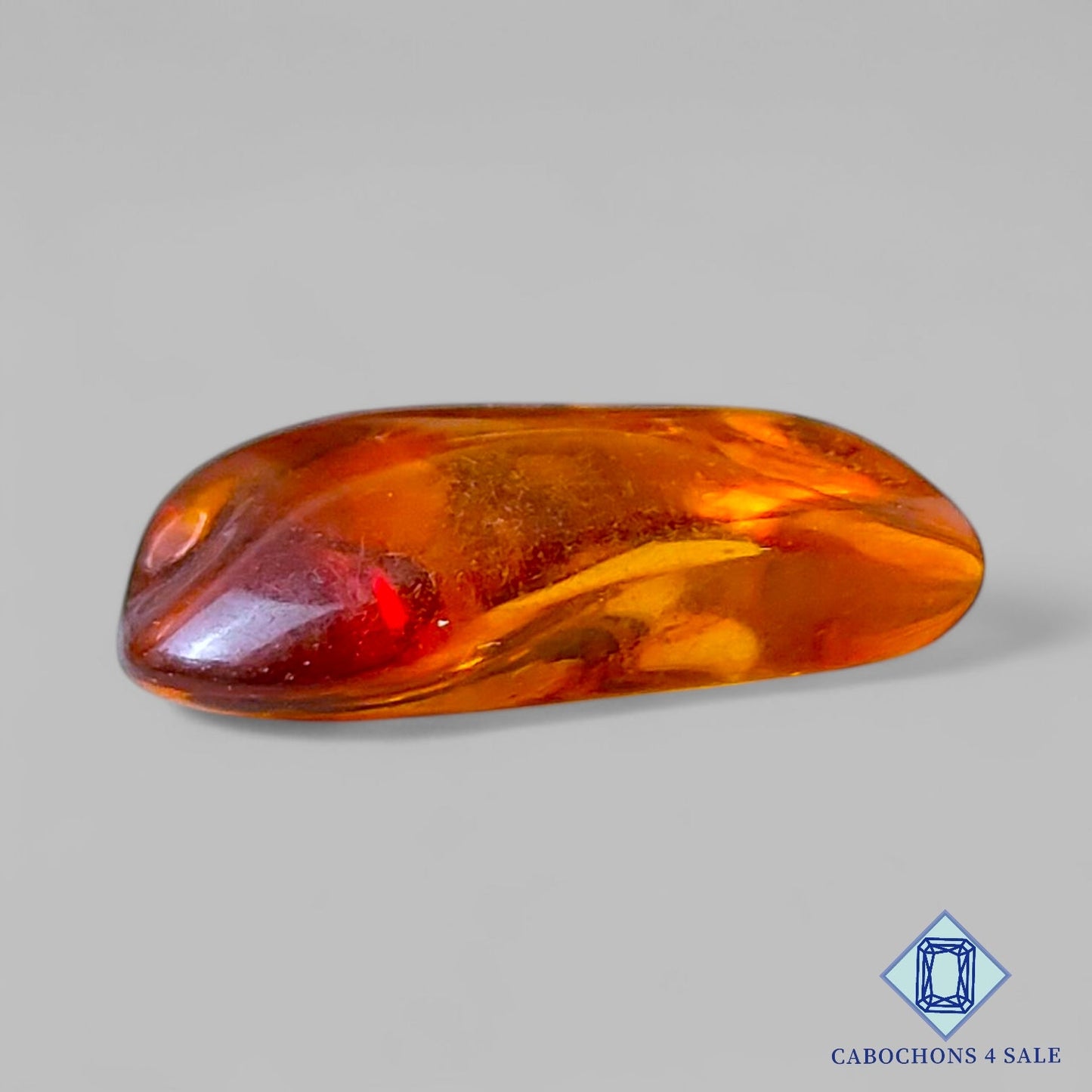 Manmade Amber Gemstone Fancy Cabochons 22*15*8mm available for sale