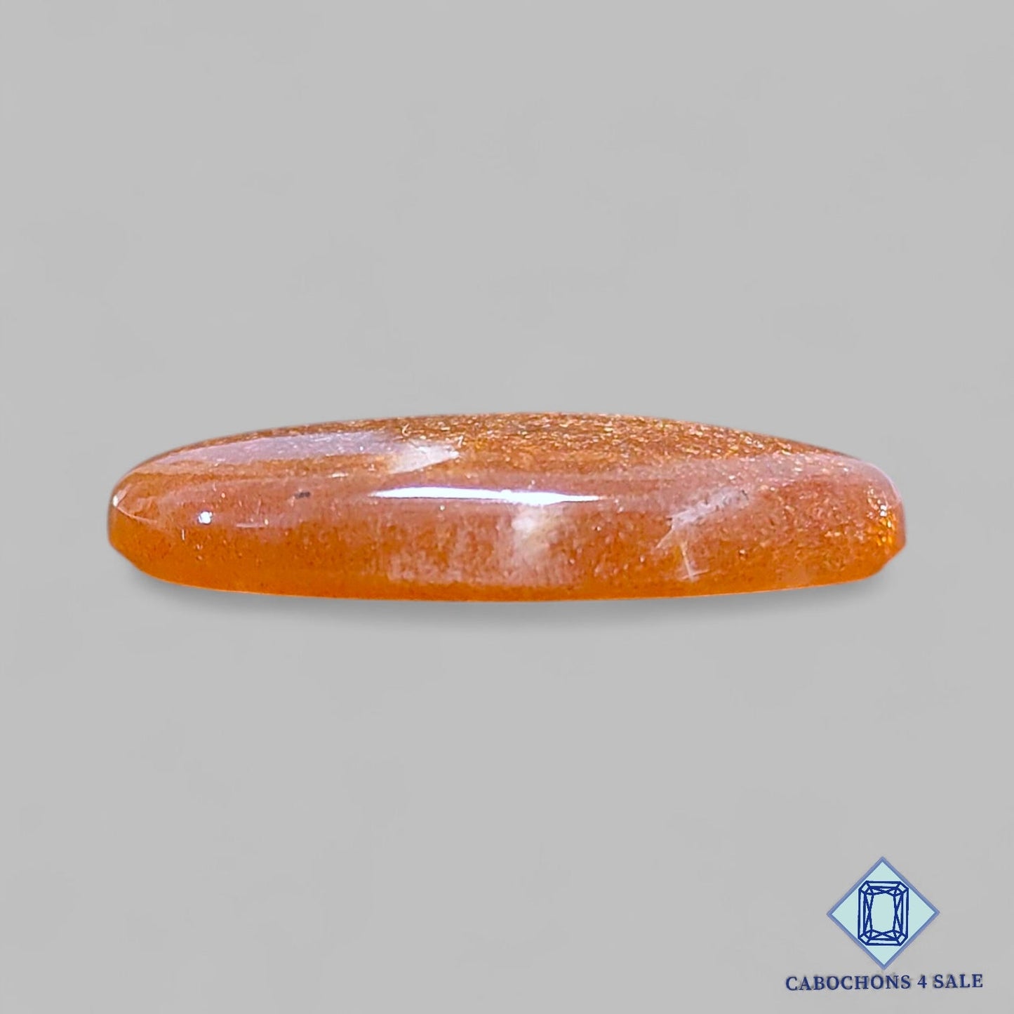 Cabujones ovalados de piedra lunar melocotón natural con piedra solar de 33 x 22 x 6 mm de Madagascar, disponibles para la venta.