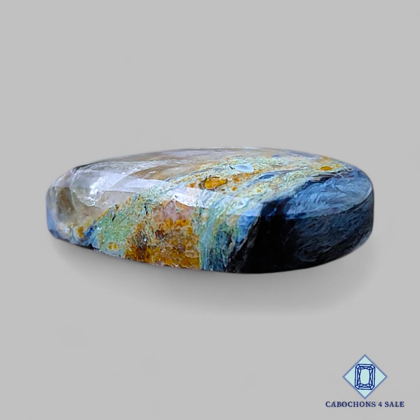 Cabujones de piedra preciosa pietersita natural en forma de pera de 24 x 17 x 7 mm, procedentes de Namibia, disponibles para la venta.