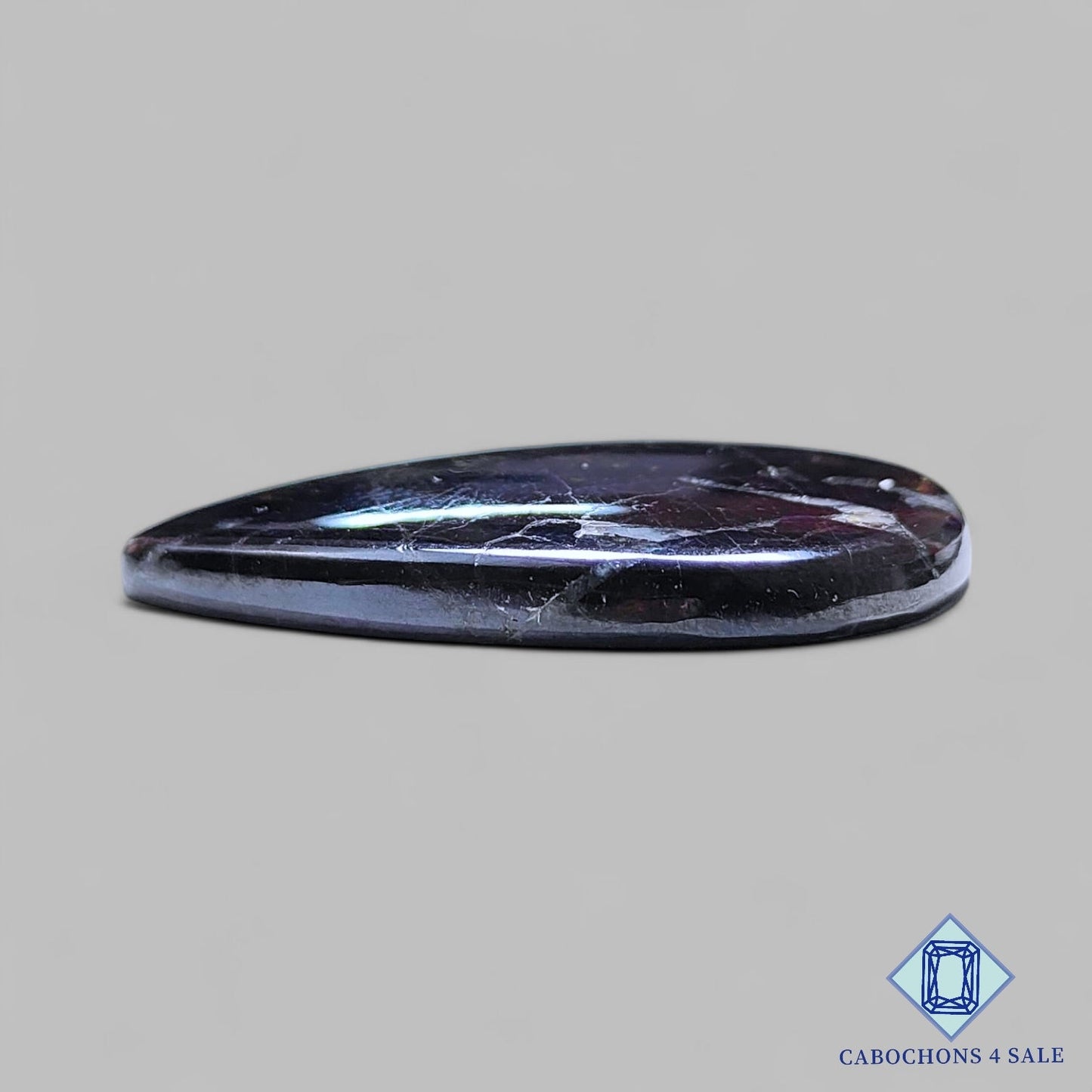 Cabujones de pera de piedra preciosa purpurita natural de 45 x 32 x 6 mm de Namibia, disponibles para la venta.