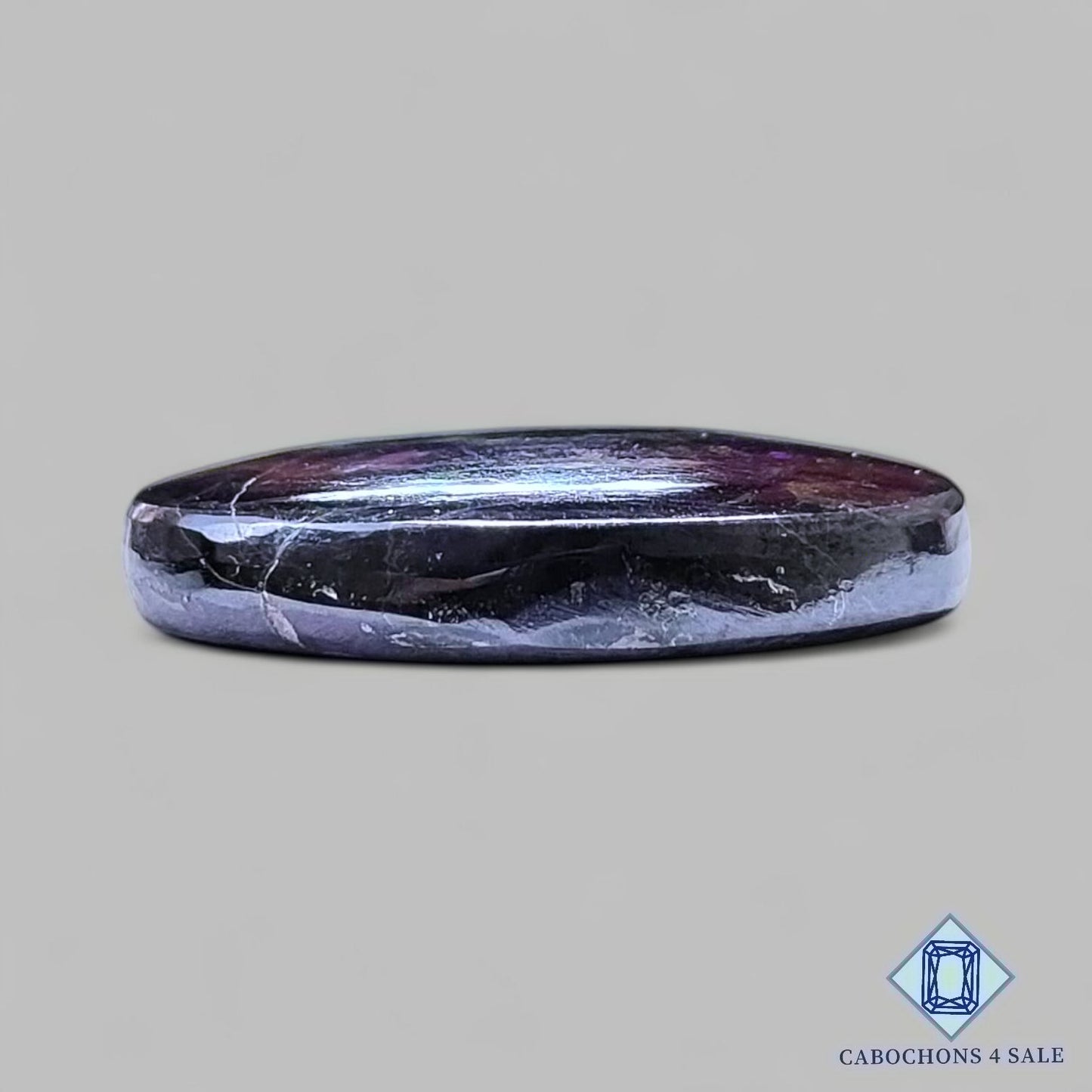 Cabujones ovalados de purpurita natural de 31 x 20 x 6 mm, procedentes de Namibia, disponibles para la venta.