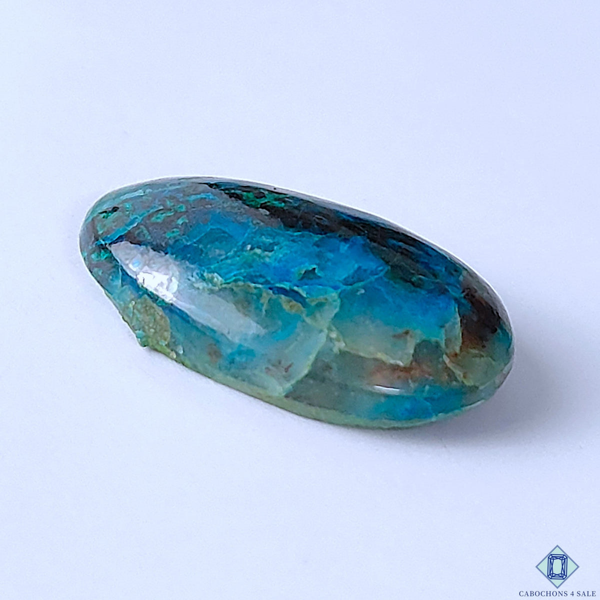 Cabochons4sale oval Quantum Quattro gemstone cabochon with vibrant blue and green natural stone patterns.