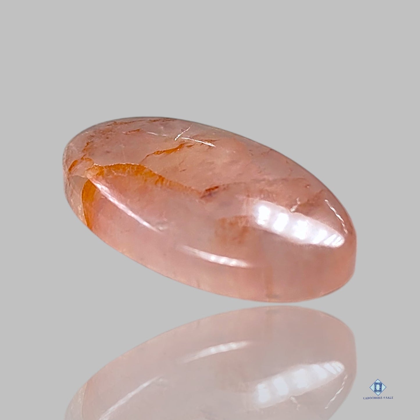 Cabujones ovalados de color cereza roja