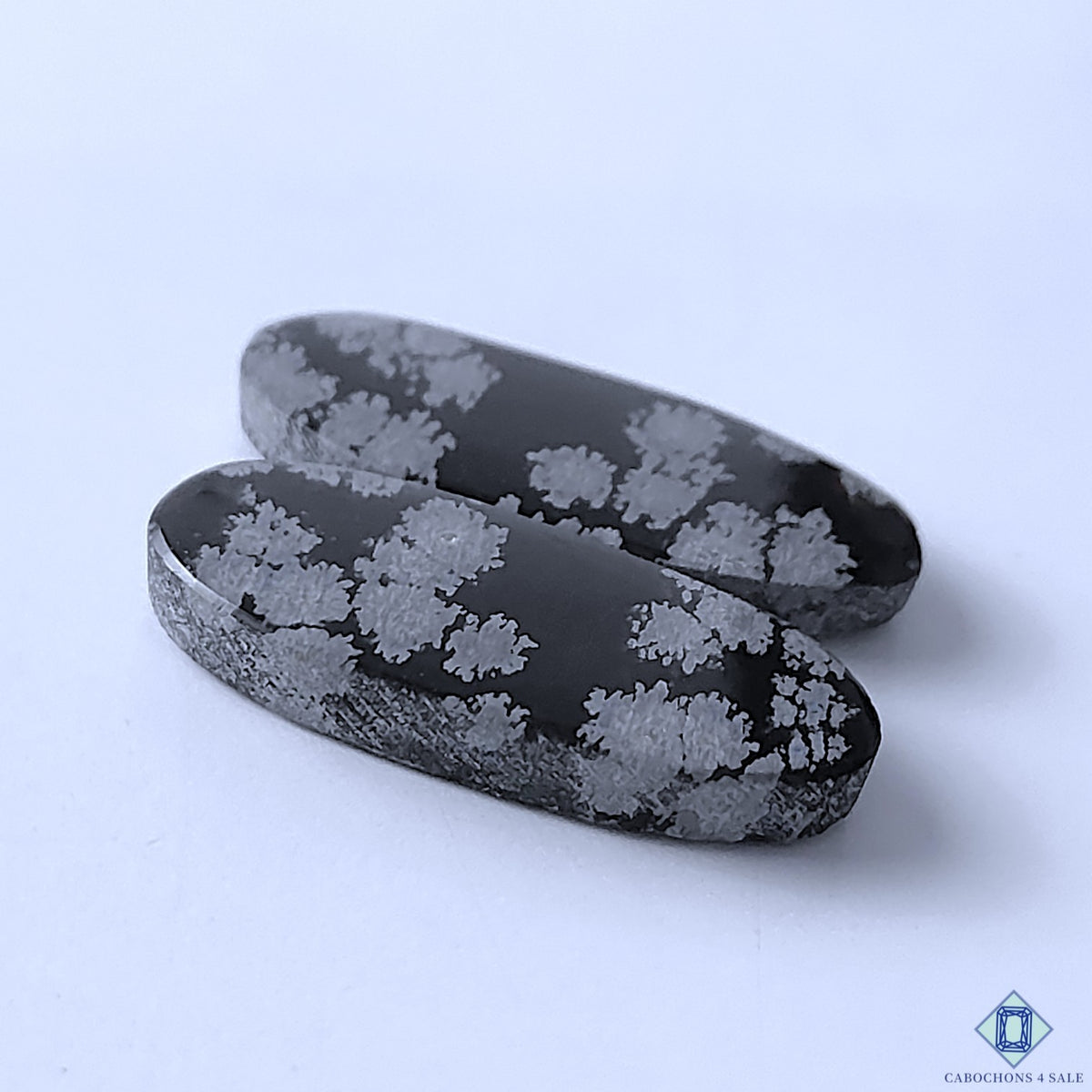 0-Snowflake_Obsidian-C4sw23079-3-Oval-Black-mm-Pairs-Opaque-0