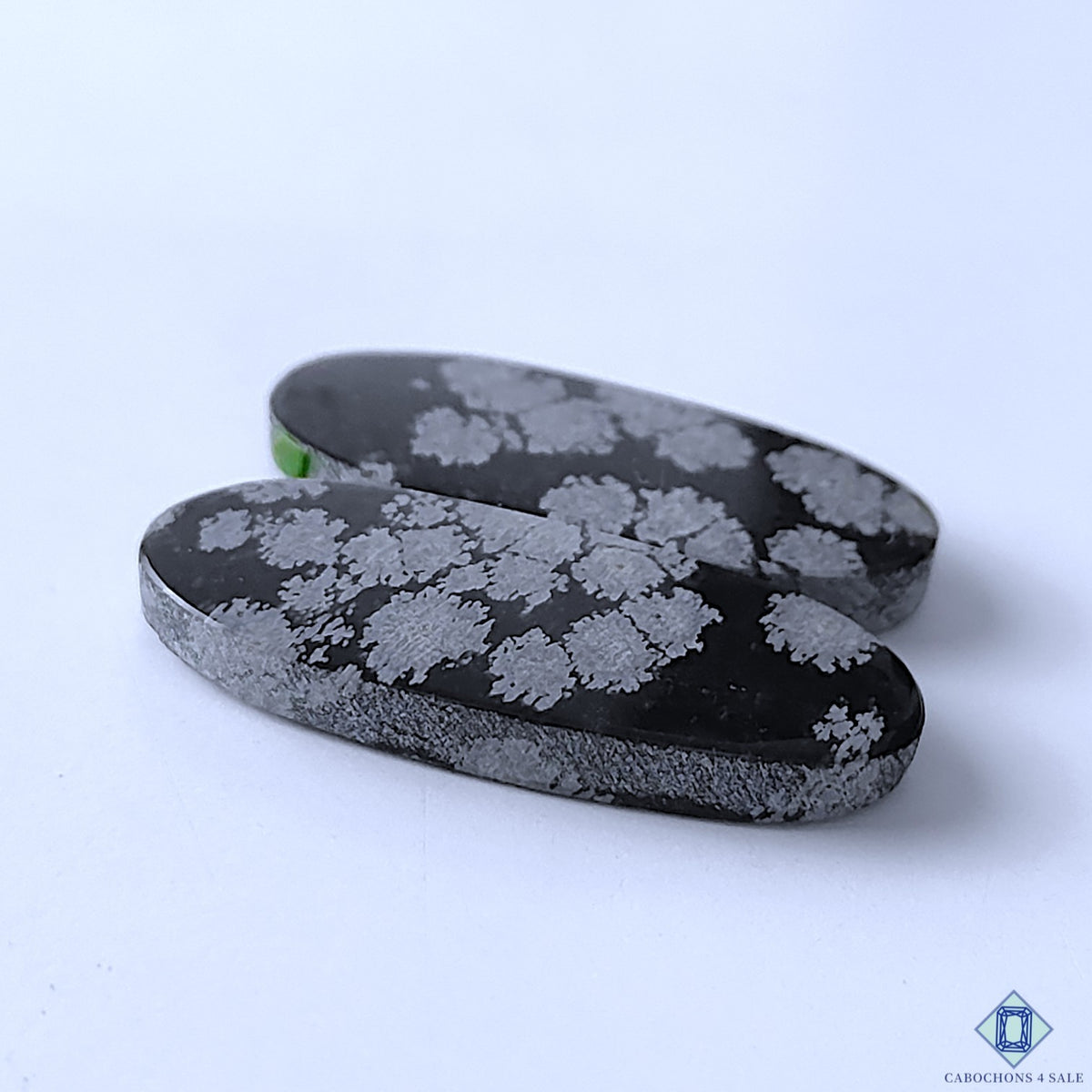 0-Snowflake_Obsidian-C4sw23080-3-Oval-Black-mm-Pairs-Opaque-0