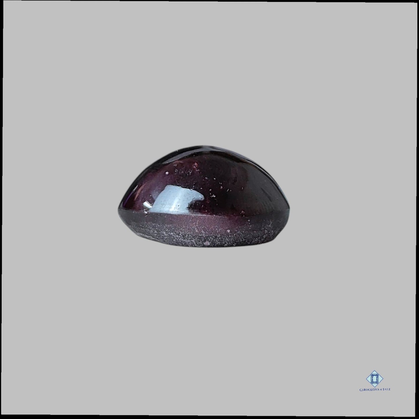 Cabujón redondo de granate estrella