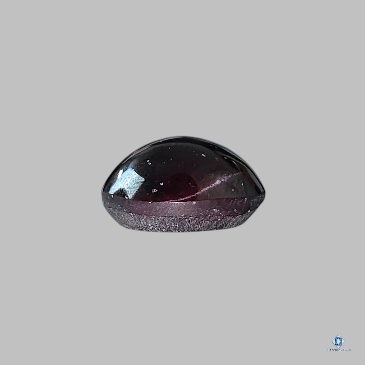 Cabujón redondo de granate estrella