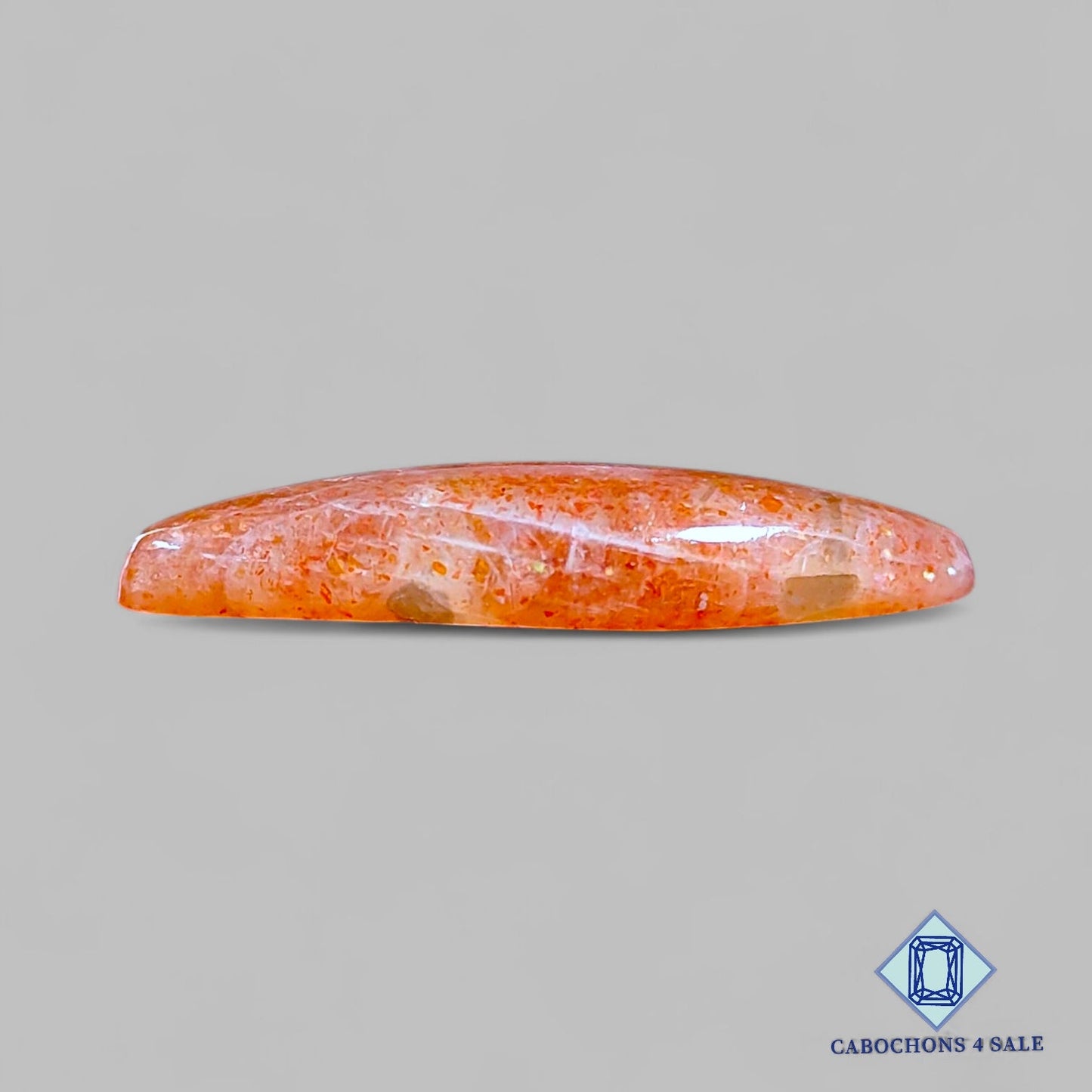 Cabujones marquesa de piedra solar de confeti natural de Tanzania, 34 x 13 x 5 mm, disponibles para la venta.