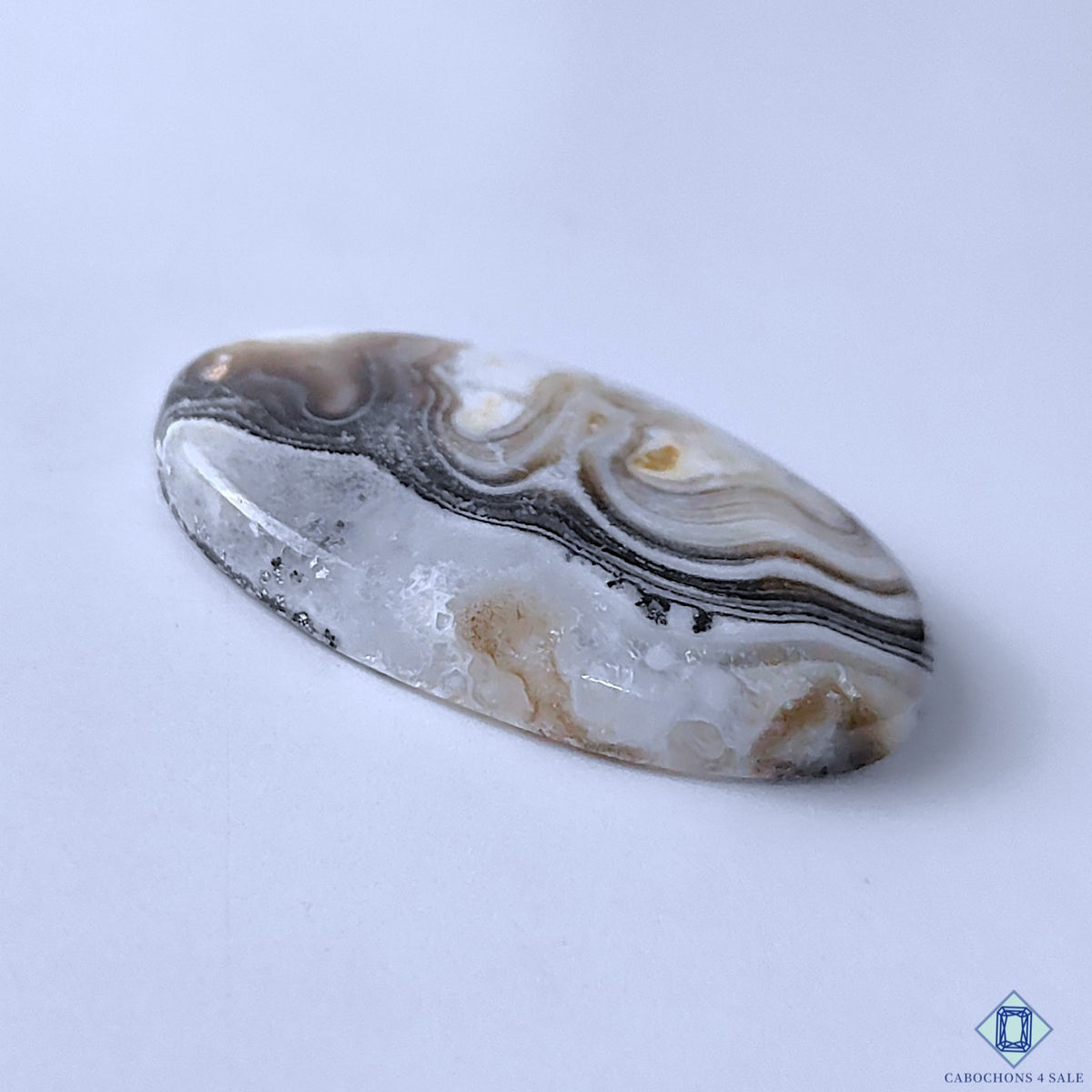 0-Zebra_Calcite-C4sw23078-3-Oval-White-mm-Cabochons-Opaque-0