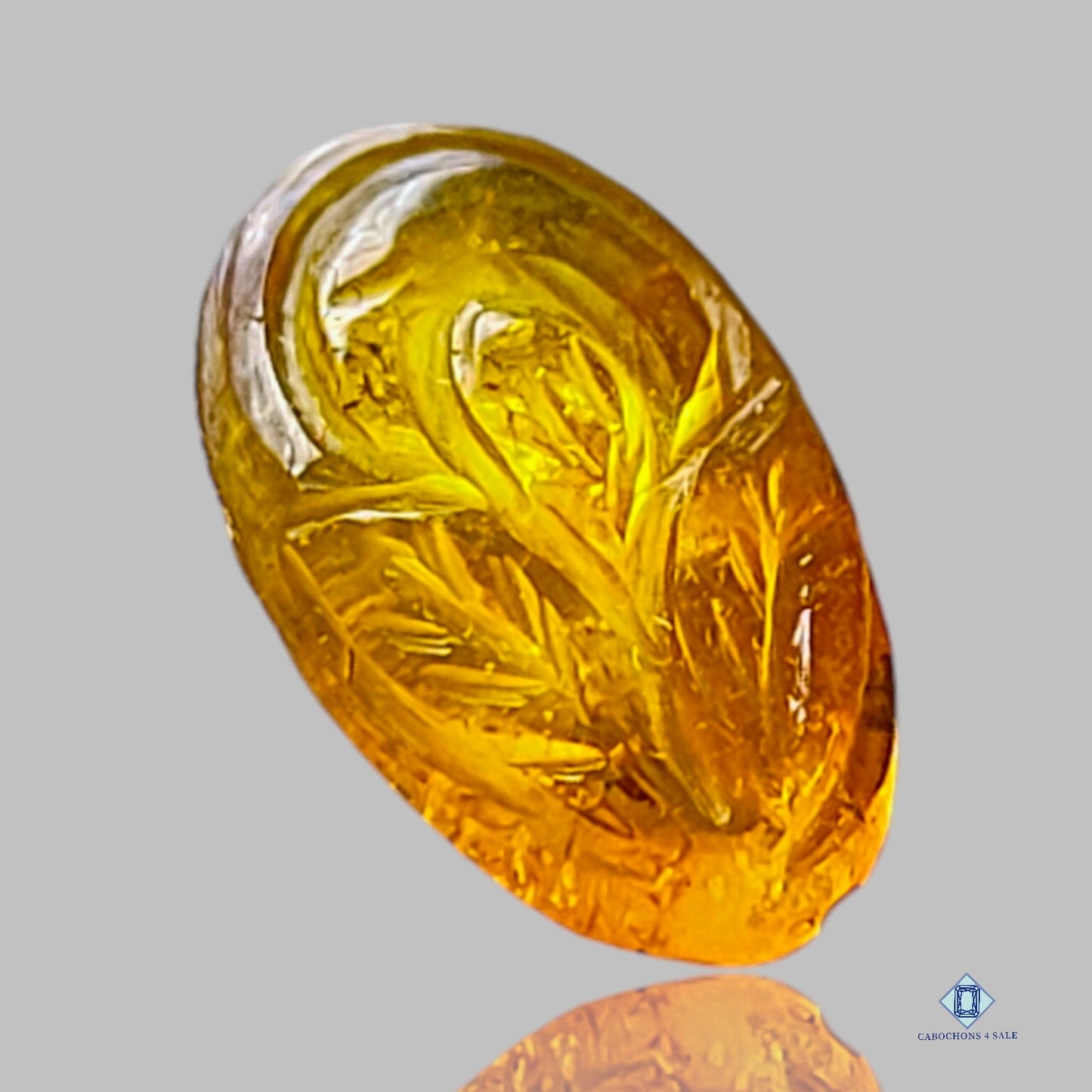 Amber Oval Carvings