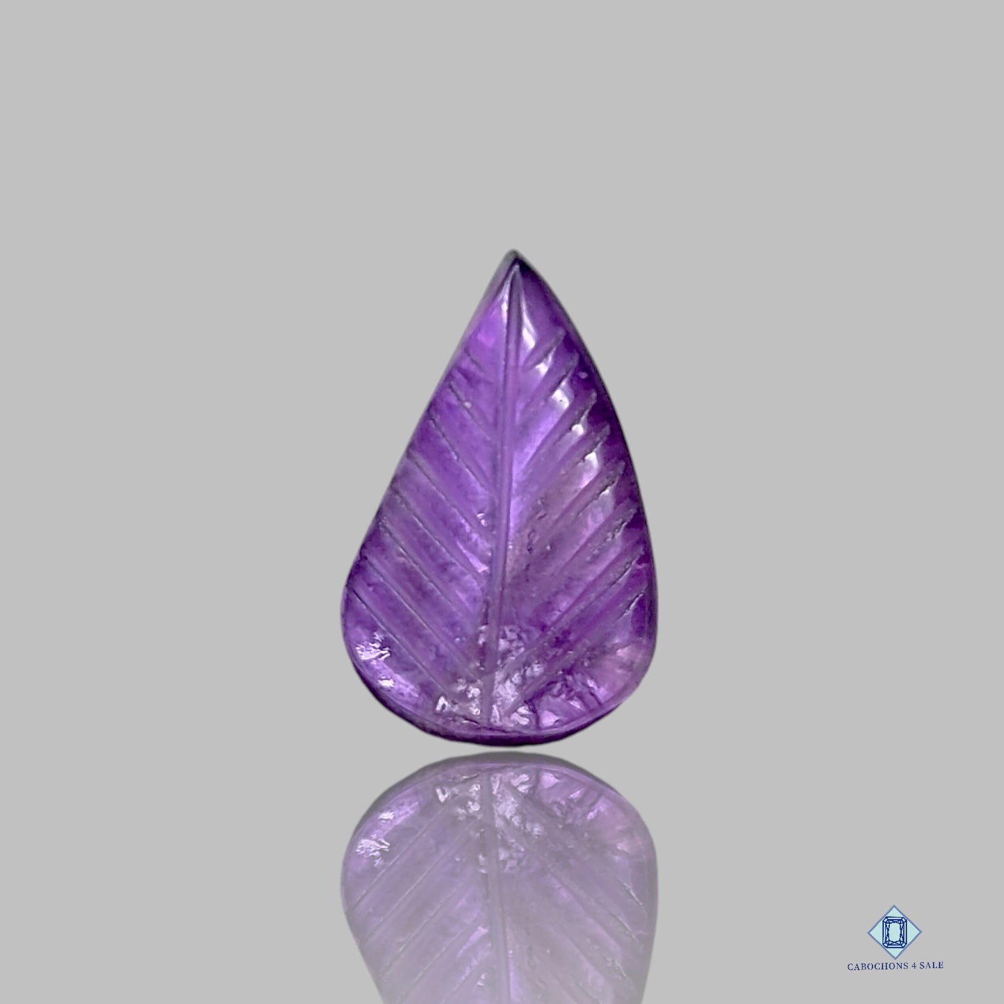 0-Amethyst-c4sw2336-3-Pear-Purpal-15_20mm-Carvings-Transparent-0