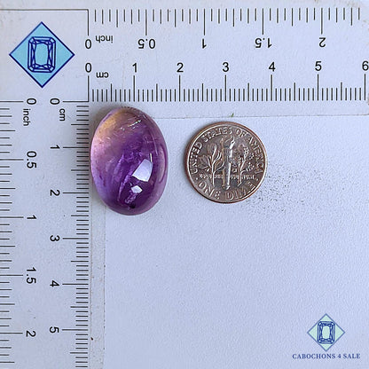 Cabujones ovalados de piedra preciosa ametrina natural de 23 x 16 x 10 mm de Bolivia, disponibles para la venta.