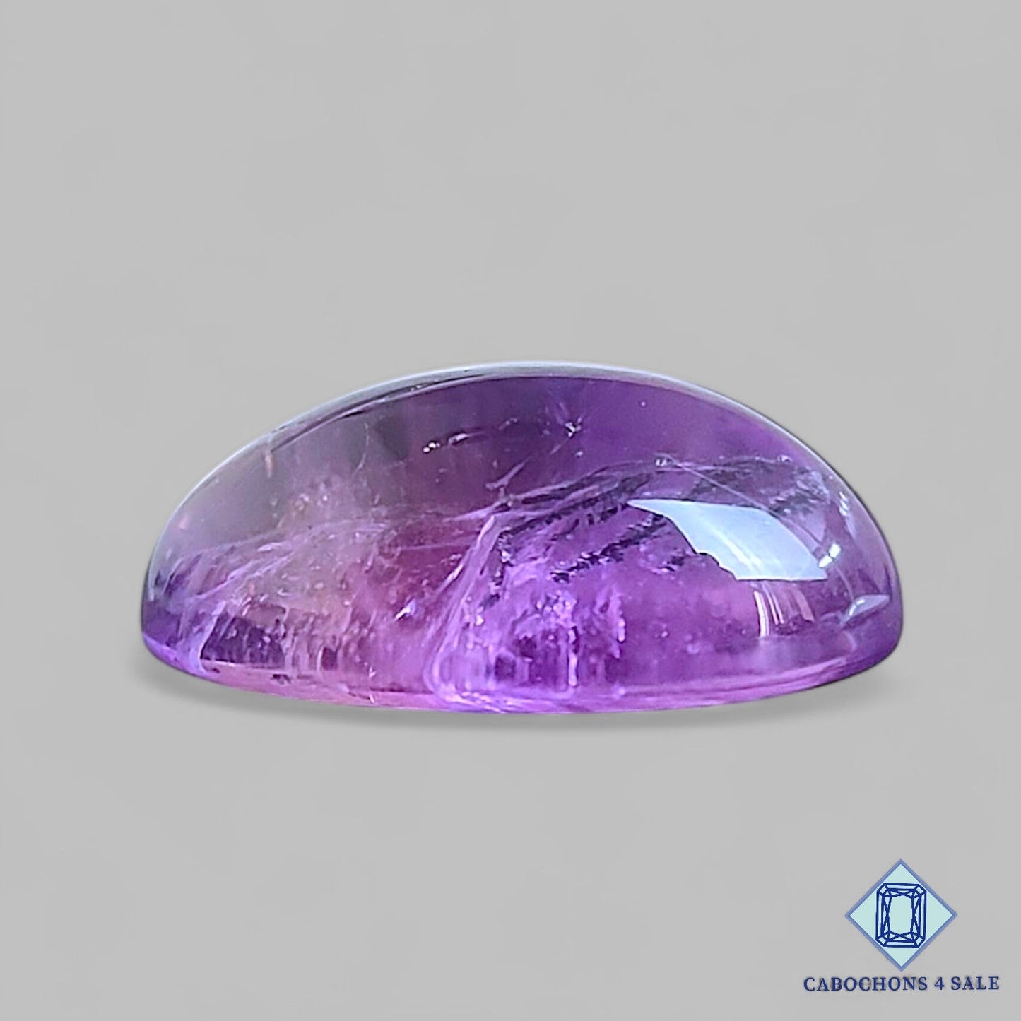 Cabujones ovalados de piedra preciosa ametrina natural de 23 x 16 x 10 mm de Bolivia, disponibles para la venta.