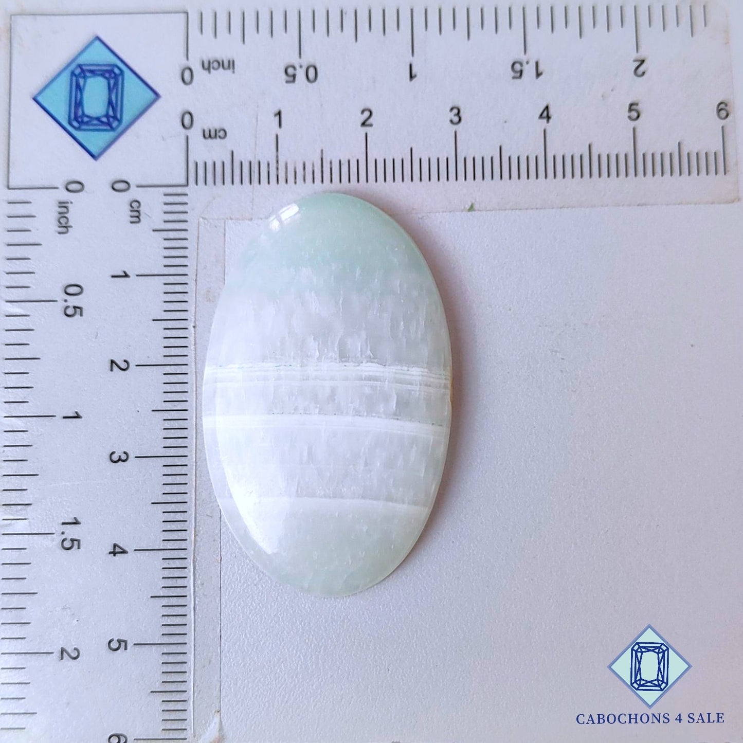 Cabujones ovalados de piedra preciosa de argonita natural de 44 x 27 x 6 mm, procedentes de Marruecos, disponibles para la venta.