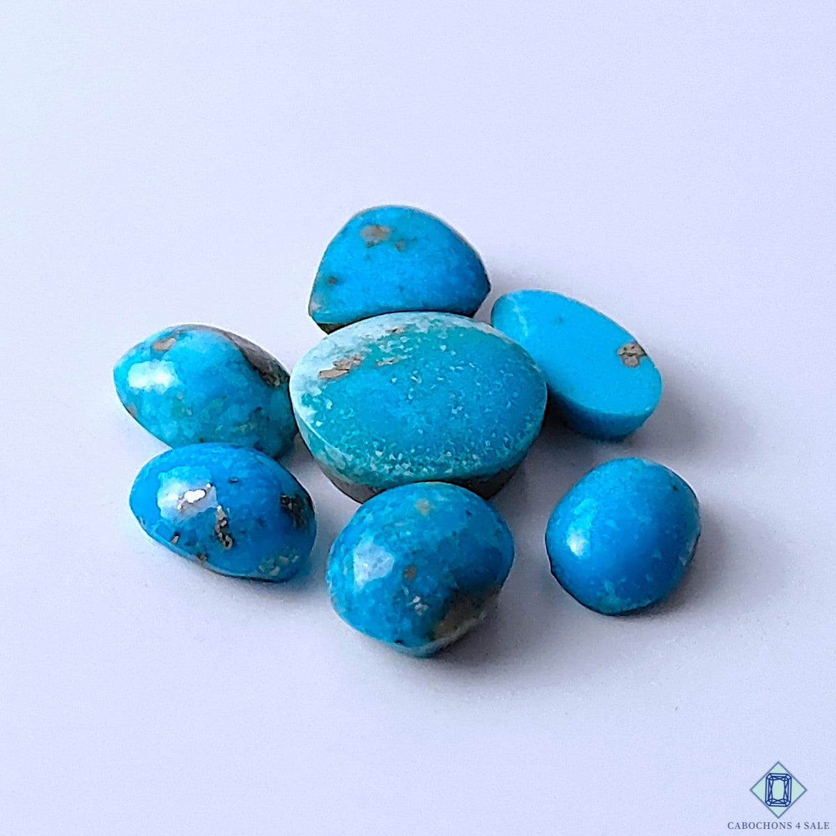 Cabochons4sale natural blue Arizona turquoise gemstone lot in assorted opaque shapes and sizes