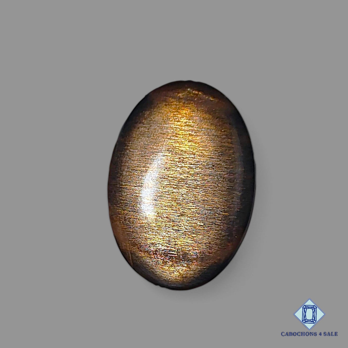 Cabujones ovalados de piedra solar negra natural de Tanzania, 32 x 23 x 5 mm, disponibles para la venta. 