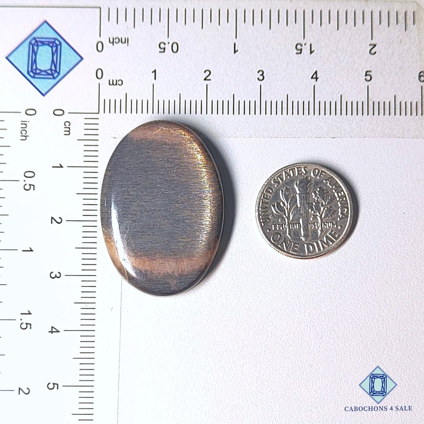 Cabujones ovalados de piedra solar negra natural de Tanzania, 32 x 23 x 5 mm, disponibles para la venta. 