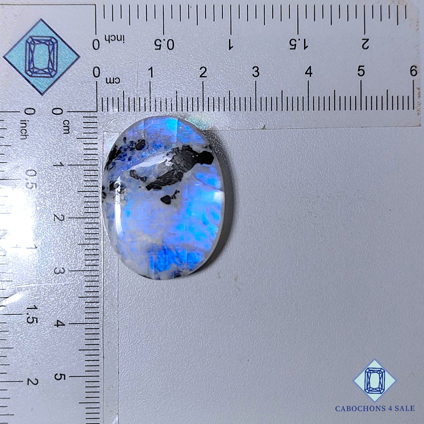 Cabujones ovalados de piedra lunar turmalina negra natural de 30 x 23 x 6 mm, de la India, disponibles para la venta.